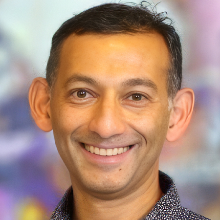 Dhiraji Mukherjee hire AI speaker book at agent Great Business Speakers,,